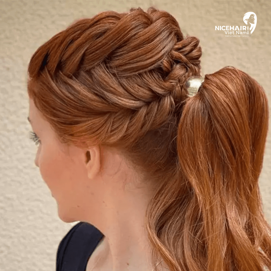 A high ponytail with an accent fishtail braid