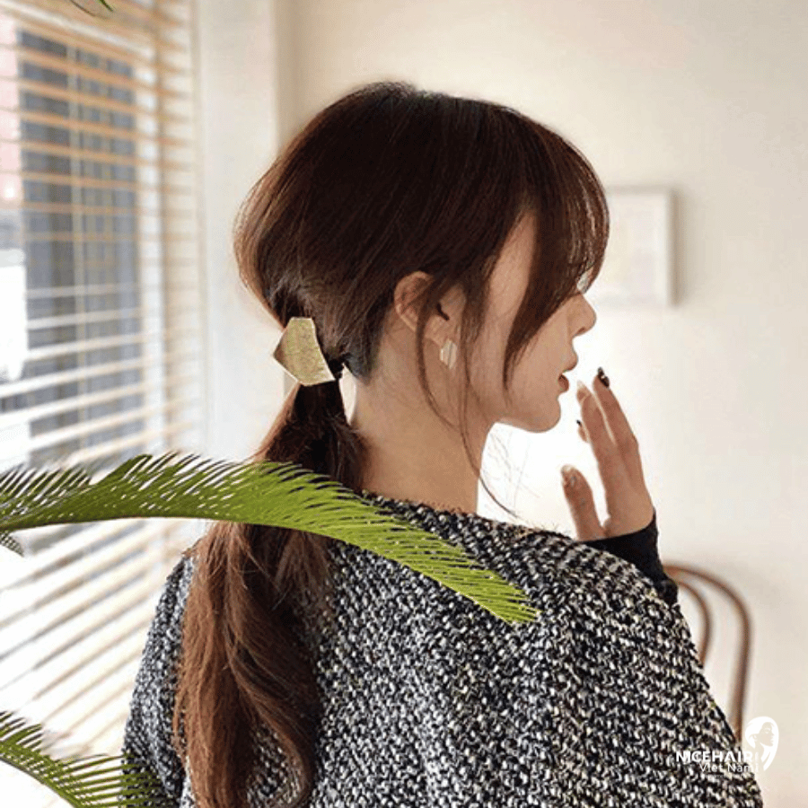  This chic and sophisticated addition to the classic low ponytail elevates your look, making it suitable for various occasions, from casual outings to formal events